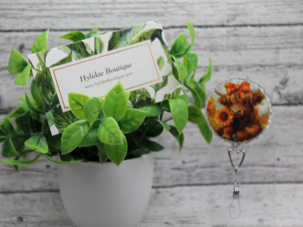 Highland Cow and Sunflowers Circle Badge Reel