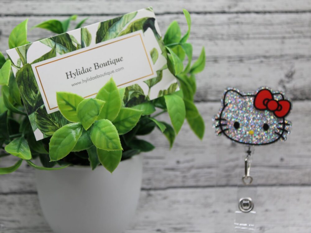 Silver Glitter Cat Face with Red Bow Badge Reel