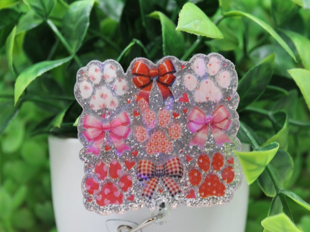 Paw Prints and Bows Holographic Badge Reel