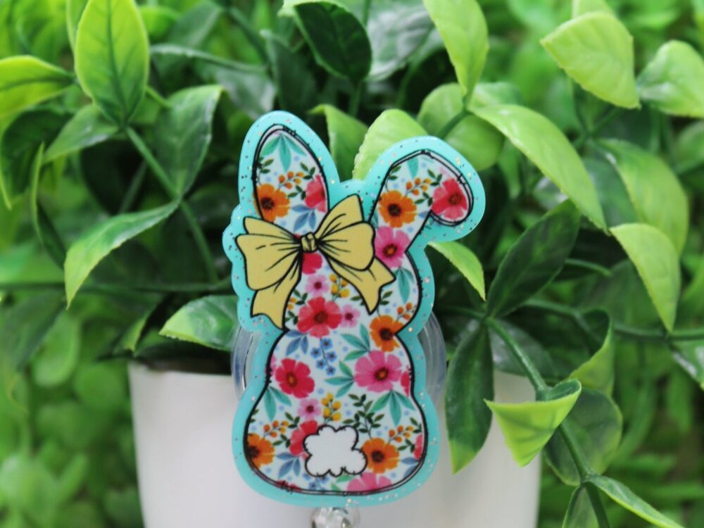 Floral Eater Rabbit with Yellow Bow Badge Reel